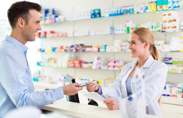Pharmacist and client at pharmacy